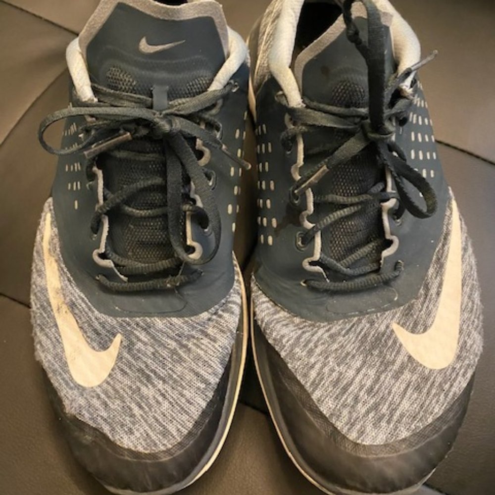Worn blue nike shoes 10.5